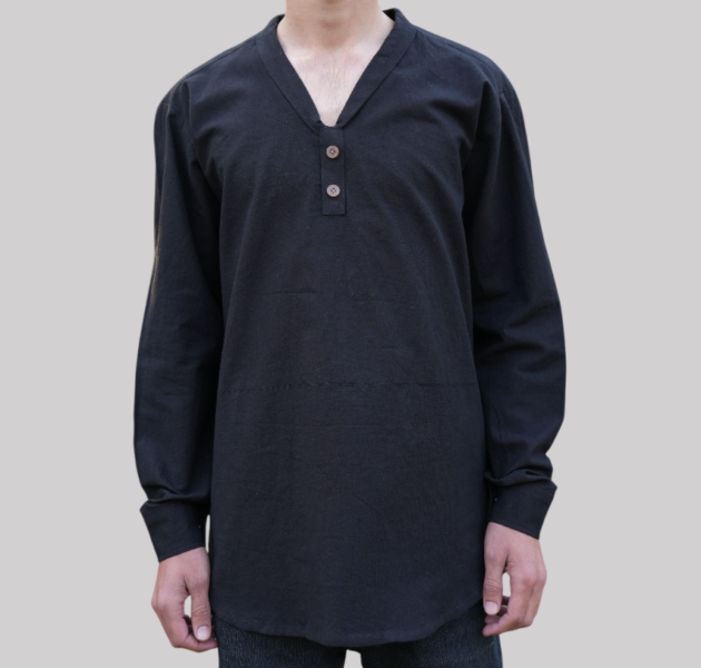 A black shirt featuring two large buttons and stylish, contemporary collars, offering a bold and fashionable look.